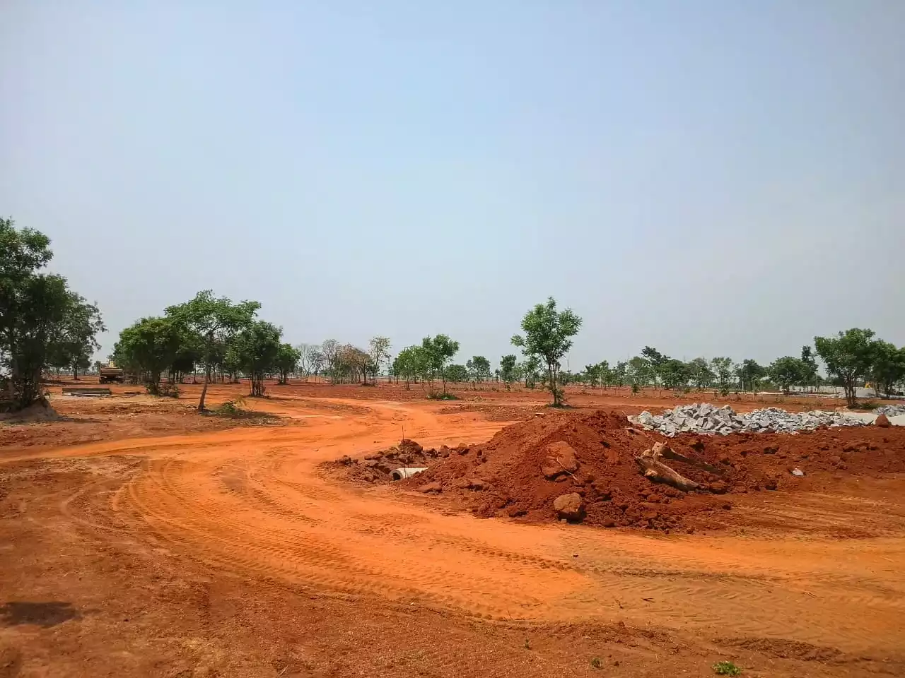 Scenic farm plot with lush greenery at KLR Farms Pedda Golconda Hyderabad